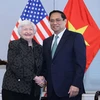 Le Premier ministre Pham Minh Chinh et la secrétaire américaine au Trésor, Janet Yellen. Photo : NDEL.