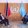Le Premier ministre Pham Minh Chinh (à gauche) et le président de la 78e session de l’Assemblée générale des Nations Unies, Dennis Francis. Photo : VNA.