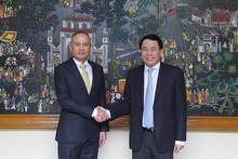 Le général de division Lê Quôc Hùng, vice-ministre vietnamien de la Sécurité publique, et le général Roy Inkapairoj, commandant en chef adjoint de la Police royale thaïlandaise. Photo : CAND.