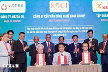 Lors de la cérémonie de signature d’un accord sur l'investissement d’une valeur de 6 milliards de dollars dans le développement d'infrastructures énergétiques et la production industrielle verte à Hô Chi Minh-Ville. Photo : VNA