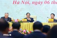 Le Premier ministre Pham Minh Chinh préside une réunion concernant le projet 06. Photo : VNA.