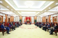 La rencontre entre To Lam et une délégation d'entreprises du Conseil des affaires États-Unis-ASEAN. Photo : VNA.