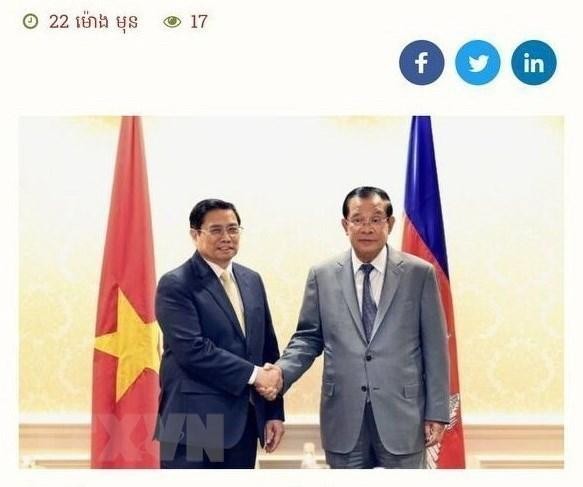 Le site Web de l'Académie royale du Cambodge (RAC) a publié les 4 et 5 novembre un article, mettant en vedette la visite du chef du gouvernement vietnamien. Photo : capture d'écran/VNA.
