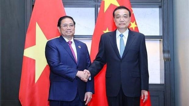 Le Premier ministre Pham Minh Chinh (à gauche) et son homologue chinoise Li Keqiang. Photo : VNA.