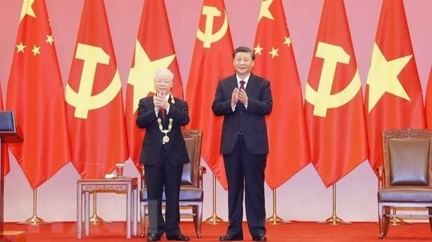 Le Secrétaire général du Parti communiste du Vietnam, Nguyên Phu Trong (à gauche) et le secrétaire général du Parti communiste chinois et Président chinois, Xi Jinping. Photo : VNA.
