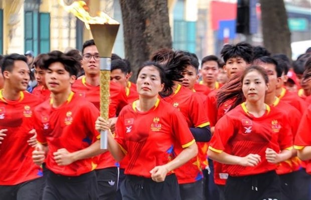 Cérémonie de relais de la torche des SEA Games 32 à Hanoï. Photo : VNA.