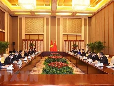 Le Secrétaire générale du Comité central du Parti communiste du Vietnam, Nguyên Phu Trong, et Li Zhanshu, Président du Comité permanent de l’Assemblée populaire nationale. Photo : VNA.