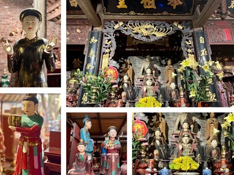 Statues de bouddha et objets cultuels sont les produits emblématiques du village de sculpteurs sur bois de Son Dông. Photo : CVN/VNA.