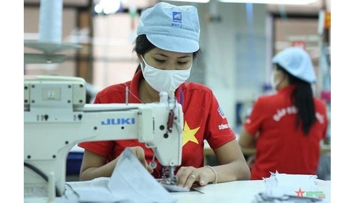 Le Vietnam vise plus de 45 milliards de dollars d'exportations de textile-habillement en 2022. Photo: qdnd.com.vn