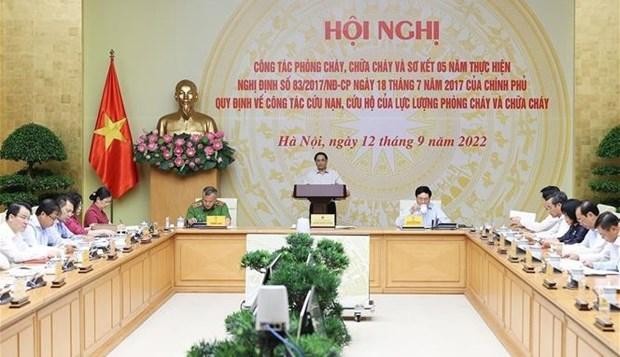 Le Premier ministre Pham Minh Chinh s'exprime lors de la conférence. Photo: VNA