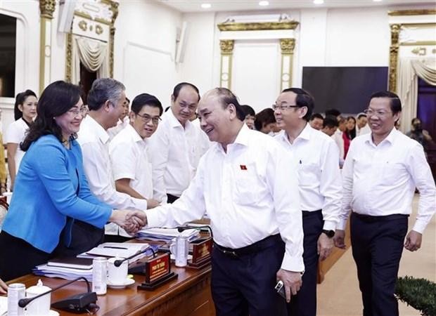 Le Président Nguyên Xuân Phuc lors de sa séance de travail avec le Comité populaire de Hô Chi Minh-Ville. Photo : VNA