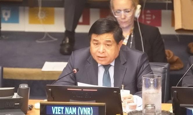 Le ministre vietnamien du Plan et de l’Investissement, Nguyên Chi Dung, prononce son discours lors du Forum. Photo : VNA.