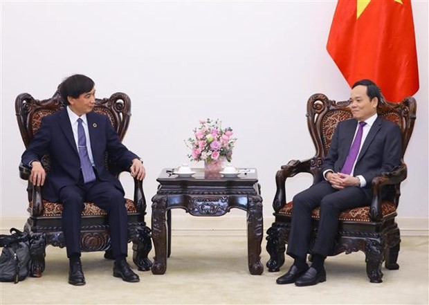 Le Vice-Premier ministre Trân Luu Quang (à droite) et le directeur général de l'Union postale universelle (UPU), Masahiko Metoki. Photo : VNA.