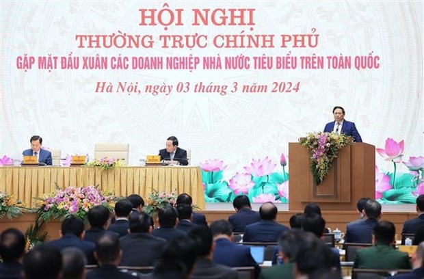 Le Premier ministre Pham Minh Chinh préside le 3 mars à Hanoï la Conférence de rencontre entre la Permanente du gouvernement et les entreprises publiques typique. Photo : VNA.