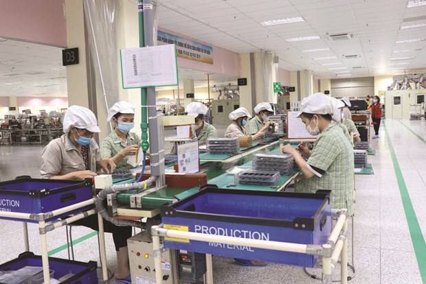 À l’entreprise Bujeon Vietnam Electronic dans la zone industrielle de Quê Vo, province de Bac Ninh (Nord). Photo : VNA/CVN.
