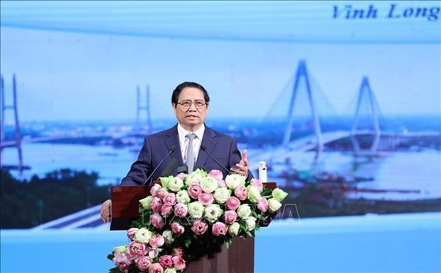 Le Premier ministre Pham Minh Chinh prend la parole lors de l’événement. Photo : VNA.