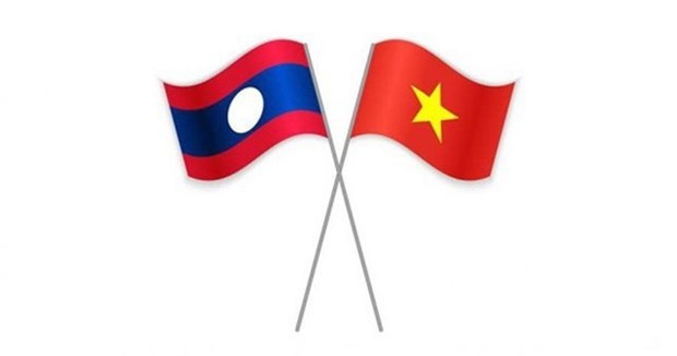 Les drapeaux du Laos et du Vietnam. Source : VGP.