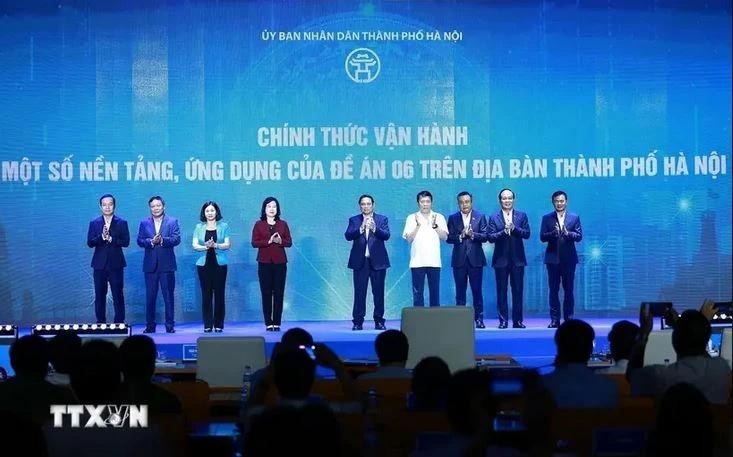 Le Premier ministre Pham Minh Chinh (centre) et d’autres délégués lors de la cérémonie, à Hanoi, le 28 juin. Photo : VNA