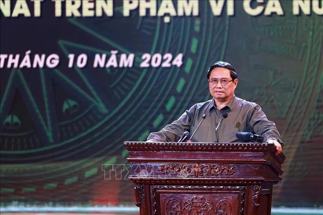 Le Premier ministre Pham Minh Chinh prend la parole lors du programme. Photo : VNA.