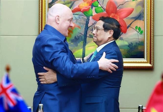 Le Premier ministre Pham Minh Chinh (droite) et son homologue néo-zélandais, Christopher Luxon. Photo: VNA