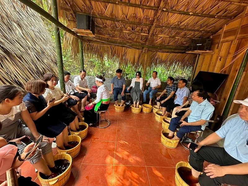 Dans le site de tourisme communautaire du hameau de Mien au district de Ba Vi. Photo : baoquocte.vn