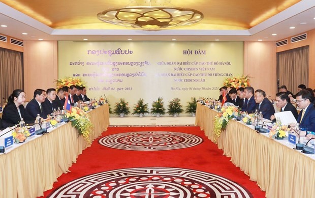 Panorama de l'entretien entre les délégations de Hanoï et de Vientiane. Photo : hanoimoi.vn