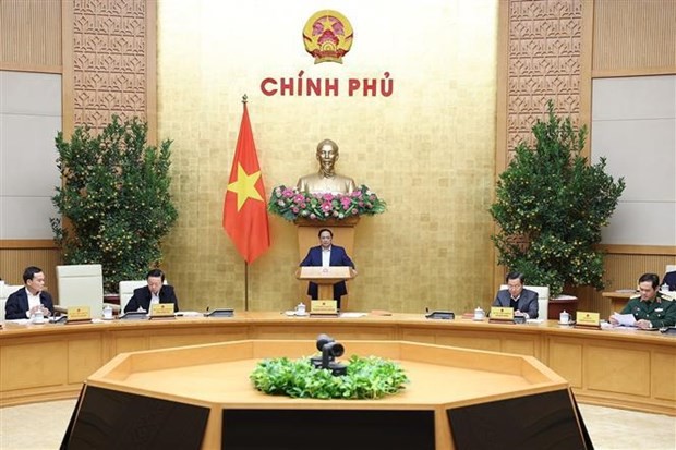 Le Premier ministre vietnamien Pham Minh Chinh (au centre) prend la parole lors de la réunion. Photo : VNA. 