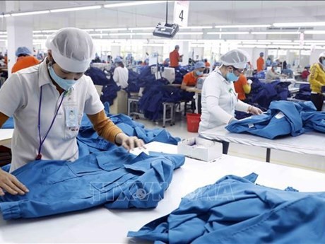 Production de textile-habillement pour l'exportation. Photo : VNA.