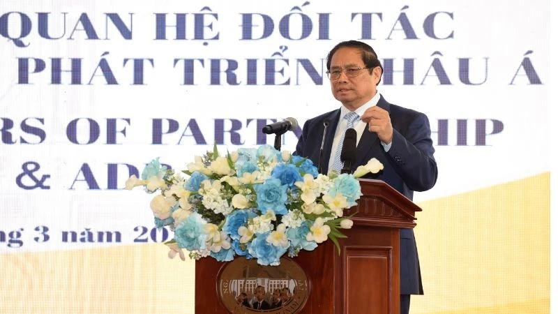 Le PM vietnamien Pham Minh Chinh, lors de la cérémonie de fêter le 30e anniversaire du partenariat Vietnam - BAD, le 13 mars à Hanoi. Photo : NDEL.