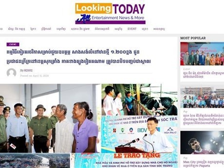 L'article sur le site d’information lookingtoday.com de Tamarind Tree News Network couvre le plan d’assistance du ministère vietnamien de la Sécurité publique dans la province de Soc Trang. Photo : VNA.