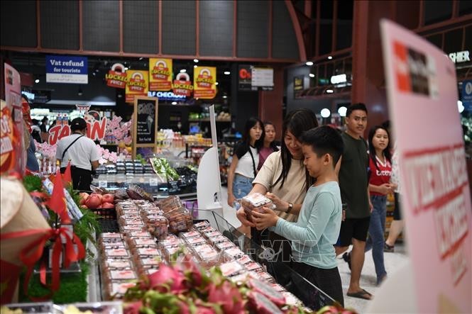 Les litchis vietnamiens deviennent familiers aux consommateurs thaïlandais. Photo : VNA.