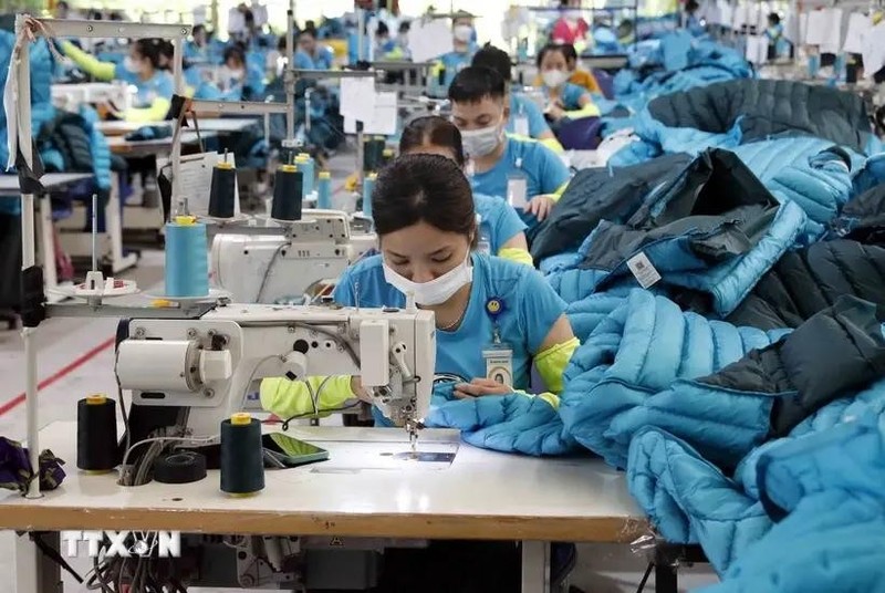 Les produits du textile et de l'habillement du Vietnam ont été exportés vers plus de 100 pays et territoires et seront expédiés vers 104 marchés l'année prochaine. Photo : VNA