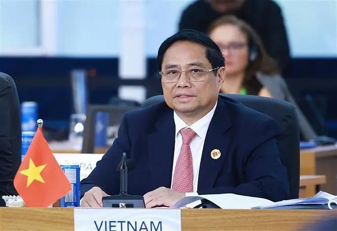 Le Premier ministre Pham Minh Chinh lors du débat sur le développement durable et la transition énergétique dans le cadre du Sommet du G20 à Rio de Janeiro. Photo: VNA