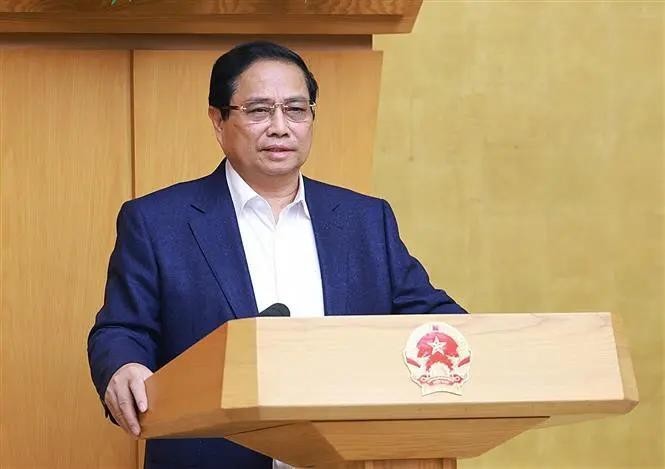 Le Premier ministre Pham Minh Chinh à la conférence gouvernementale sur le dressement du bilan de la mise en œuvre de la Résolution n° 18-NQ/TW. Photo : VNA.