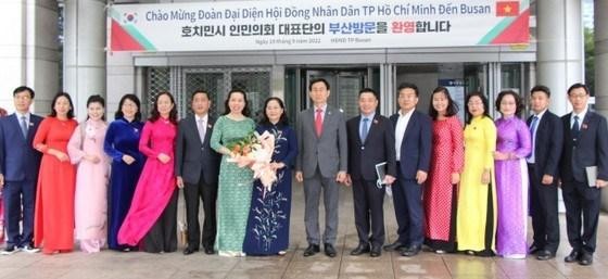 Des délégués de Hô Chi Minh-Ville à Busan. Photo: SGGP 