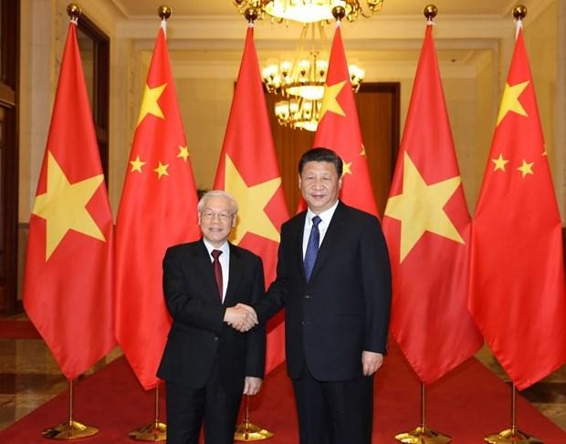 Le Secrétaire général du Comité central du PCV, Nguyên Phu Trong (à gauche), et le Secrétaire général du Comité central du PCC et Président chinois, Xi Jinping. Photo : VNA.