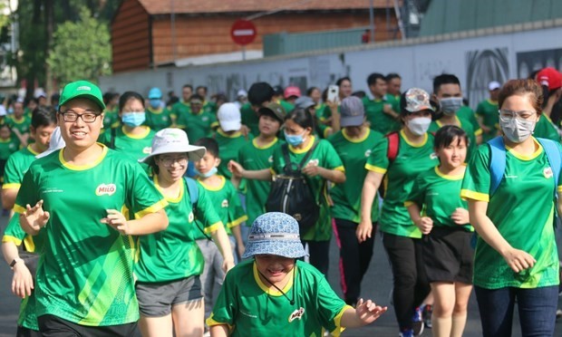 La Journée de la course olympique dans le premier arrondissement de Hô Chi Minh-Ville, le 26 mars. Photo : VNA.