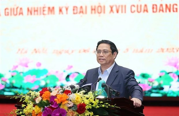 Le Premier ministre Pham Minh Chinh lors de la réunion. Photo : VNA.