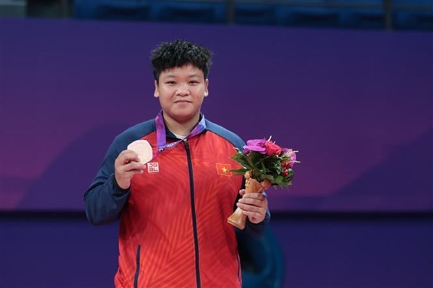  La lutteuse Vo Thi Phuong Quynh remporte le 2 octobre une médaille de bronze. Photo: VNA
