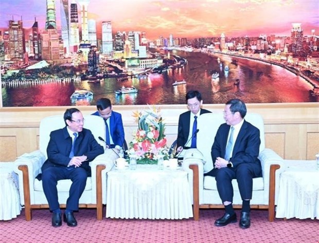 Entrevue entre le secrétaire du Comité du Parti de Hô Chi Minh-Ville, Nguyen Van Nen, et le secrétaire du Comité du Parti de Shanghai, Chen Jining. Photo: VNA