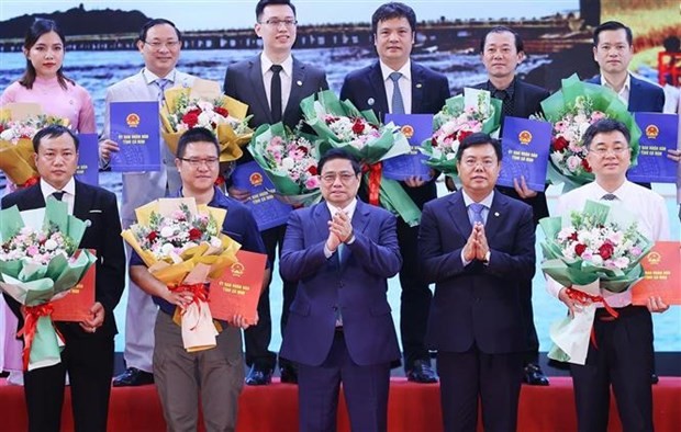 Le Premier ministre vietnamien, Pham Minh Chinh (au milieu, au 1er rang), lors de l'événement. Photo : VNA.
