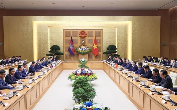 Entretien entre les Premiers ministres vietnamien et cambodgien. Photo : VNA.