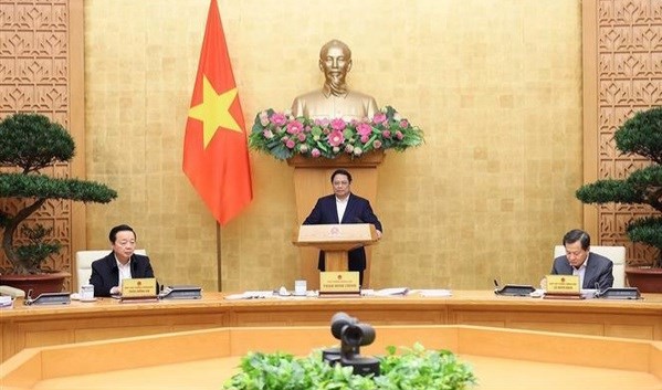Le Premier ministre Pham Minh Chinh préside le 26 décembre à Hanoï une réunion pour examiner sept propositions sur l'élaboration de lois, d'ordonnances et de deux projets de loi. Photo : VNA