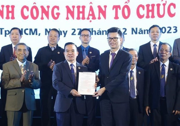 Cérémonie de remise de la décision du ministère de l’Intérieur de reconnaître l’Église du plein évangile du Vietnam comme organisation religieuse, à Hô Chi Minh-Ville, le 27 décembre. Photo : VNA.