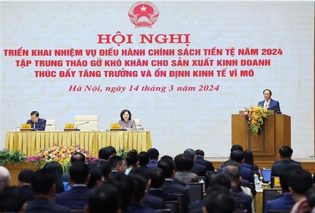Le Premier ministre Pham Minh Chinh s'exprime lors de la conférence. Photo : VNA.