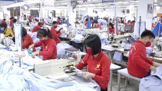 De nombreuses entreprises de l’ASEAN choisissent le Vietnam pour développer leurs activités. Photo : VNA.