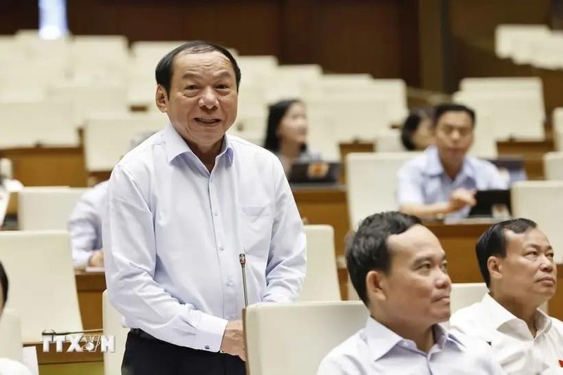 Le ministre de la Culture, des Sports et du Tourisme Nguyen Van Hung à la séance de questions au gouvernement du 21 août. Photo: VNA.