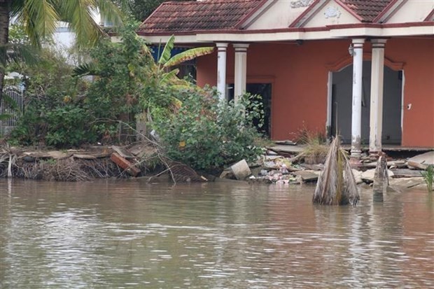 Une maison dans la province de Tien Giang (Sud) innondée par le changement climatique. Photo : VNA