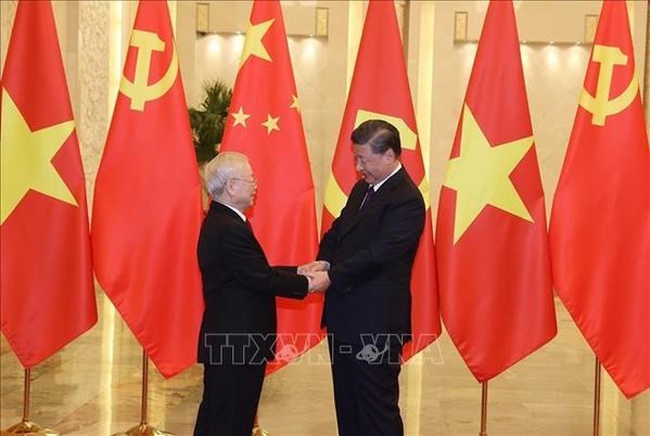 Le secrétaire général du Comité central du Parti communiste chinois (PCC) et président de la Chine, Xi Jinping reçoiti le secrétaire général Nguyen Phu Trong et une délégation vietnamienne de haut rang en visite officielle en République populaire de Chine, en novembre 2022. Photo : VNA