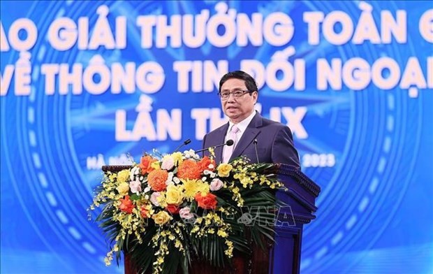 Le Premier ministre Pham Minh Chinh s'exprime lors de la cérémonie de remise du 9e Prix national de la presse d’information extérieure, à Hanoi, le 12 octobre. Photo: VNA